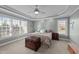 A serene main bedroom with a tray ceiling, natural light, and neutral decor at 101 Mantle Dr, Clayton, NC 27527
