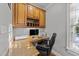 Bright and functional home office space with built-in cabinets and granite countertops at 101 Mantle Dr, Clayton, NC 27527
