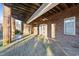 Covered patio area featuring brick columns and ceilings with ceiling fans at 101 Mantle Dr, Clayton, NC 27527