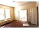 Empty bedroom featuring hardwood floors, a radiator, and ample natural light at 1101 Sunset Ave, Rocky Mount, NC 27804