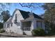 Classic white brick home with a columned porch and arched window feature at 1101 Sunset Ave, Rocky Mount, NC 27804