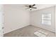 Neutral bedroom with ceiling fan and bright natural light at 115 Dolomite Dr, Gibsonville, NC 27249