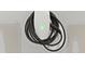 Tesla electric vehicle charger in garage at 115 Dolomite Dr, Gibsonville, NC 27249