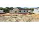 Home's backyard showing some landscaping, ready for personalization and outdoor enjoyment at 120 Gobbler Dr, Smithfield, NC 27577