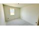 Bright bedroom with a window, offering natural light and a blank canvas for personalization at 120 Gobbler Dr, Smithfield, NC 27577