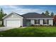 Charming single-story home features a two-car garage, a welcoming front porch, and low-maintenance landscaping at 120 Gobbler Dr, Smithfield, NC 27577