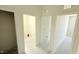 Hallway leading to various rooms showcases multiple entryways and open spaces at 120 Gobbler Dr, Smithfield, NC 27577