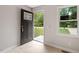 Entryway with a black door and a window at 1213 Freeman Dr, Sanford, NC 27330