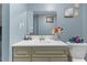 Bathroom with a vanity, white countertop and a decorative mirror at 12507 N Roxboro St, Rougemont, NC 27572