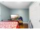 Bright bedroom with a large window, closet, and neutral decor at 12507 N Roxboro St, Rougemont, NC 27572