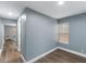 Bedroom with wood-look flooring and lots of natural light from the window at 12507 N Roxboro St, Rougemont, NC 27572