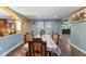 Light-filled dining room featuring wood floors and an open layout to other living spaces at 12507 N Roxboro St, Rougemont, NC 27572