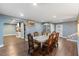 Open dining area with hardwood floors features an adjacent room and built in cabinet at 12507 N Roxboro St, Rougemont, NC 27572