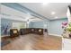 Spacious living room with hardwood floors and a ceiling fan, great for entertaining guests at 12507 N Roxboro St, Rougemont, NC 27572
