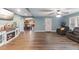 Living room showcasing wood floors, fireplace, and furniture at 12507 N Roxboro St, Rougemont, NC 27572