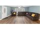 Inviting living area features natural light, hardwood flooring, and comfortable seating at 12507 N Roxboro St, Rougemont, NC 27572