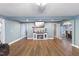 Cozy living area featuring a fireplace, hardwood floors, and an open floor plan at 12507 N Roxboro St, Rougemont, NC 27572