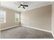 Spacious bedroom with neutral carpet, crown molding and bright windows at 158 Futrell Ridge Ct, Chapel Hill, NC 27517