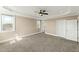 This bedroom features neutral paint colors and large windows that provide an abundance of natural light at 158 Futrell Ridge Ct, Chapel Hill, NC 27517