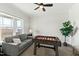 Game room featuring a foosball table, couch, and large window with scenic views at 158 Futrell Ridge Ct, Chapel Hill, NC 27517