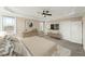 This bedroom features a tray ceiling, a ceiling fan, and lots of natural light from the windows at 158 Futrell Ridge Ct, Chapel Hill, NC 27517