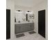 Bathroom with double sink vanity, black hardware, and a large framed mirror at 167 S Harvest Ridge Way # Homesite 223, Wilson's Mills, NC 27520