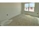 A view of an unfinished bedroom with a window at 167 S Harvest Ridge Way # Homesite 223, Wilson's Mills, NC 27520