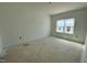 Clean bedroom showcasing natural light from the windows, ready for flooring and creative design at 167 S Harvest Ridge Way # Homesite 223, Wilson's Mills, NC 27520