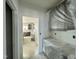 View of the unfinished kitchen, showcasing dark cabinets covered in protective plastic at 167 S Harvest Ridge Way # Homesite 223, Wilson's Mills, NC 27520