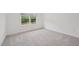Bedroom featuring plush carpeting and a single window bringing in natural light at 167 S Harvest Ridge Way # Homesite 223, Wilson's Mills, NC 27520