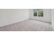 Bedroom featuring plush carpeting and a single window bringing in natural light at 167 S Harvest Ridge Way # Homesite 223, Wilson's Mills, NC 27520