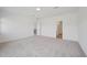 Spacious bonus room featuring neutral color palette with lots of natural light and adjoining rooms at 167 S Harvest Ridge Way # Homesite 223, Wilson's Mills, NC 27520