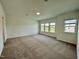 Large bonus room with plush carpet and views from many windows at 167 S Harvest Ridge Way # Homesite 223, Wilson's Mills, NC 27520