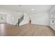 Bright and spacious living room with modern flooring and access to other areas at 167 S Harvest Ridge Way # Homesite 223, Wilson's Mills, NC 27520