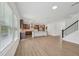 Spacious living room and kitchen with lots of natural light and modern flooring at 167 S Harvest Ridge Way # Homesite 223, Wilson's Mills, NC 27520