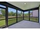 Screened-in porch offering peaceful outdoor views, perfect for relaxation at 167 S Harvest Ridge Way # Homesite 223, Wilson's Mills, NC 27520