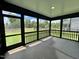 Relaxing screened porch with views of the backyard at 167 S Harvest Ridge Way # Homesite 223, Wilson's Mills, NC 27520