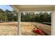 View of backyard from covered porch featuring a large unlandscaped space at 178 Gobbler Dr, Smithfield, NC 27577