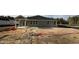 New construction home, shows backyard grading and covered patio at 178 Gobbler Dr, Smithfield, NC 27577