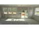 Bright living room features abundant natural light with sliding glass door to backyard at 178 Gobbler Dr, Smithfield, NC 27577