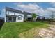 Fenced backyard featuring a well-maintained lawn at 1872 Stagecoach Trl, Wendell, NC 27591