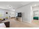 Bright bonus room featuring neutral walls, plush carpeting, a large television, and access to an adjacent bedroom at 1872 Stagecoach Trl, Wendell, NC 27591
