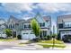 Charming two-story home with a two-car garage, manicured lawn, and inviting curb appeal at 1872 Stagecoach Trl, Wendell, NC 27591
