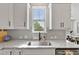 Kitchen featuring granite countertops, stainless steel sink, and a window with a view to the outside at 1872 Stagecoach Trl, Wendell, NC 27591
