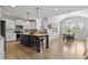 Open-concept kitchen features a large island, stainless steel appliances, and ample cabinet space at 1872 Stagecoach Trl, Wendell, NC 27591