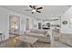 Open-concept living area flowing into a kitchen with ample natural light at 1872 Stagecoach Trl, Wendell, NC 27591