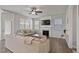 Bright living room featuring fireplace, TV, and comfortable seating at 1872 Stagecoach Trl, Wendell, NC 27591