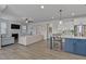 The spacious open-concept combines the kitchen, living room, and dining area at 1872 Stagecoach Trl, Wendell, NC 27591