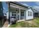 Covered patio complete with outdoor seating and a grill at 1872 Stagecoach Trl, Wendell, NC 27591