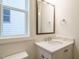 Bathroom features a vanity with a light countertop and ample lighting at 213 Big Bradley Dr, Wendell, NC 27591